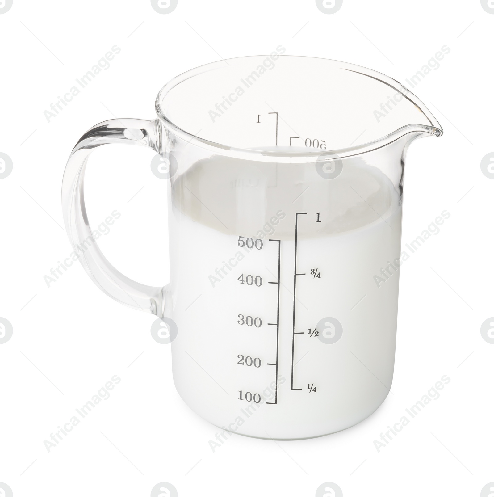 Photo of Fresh milk in measuring cup isolated on white