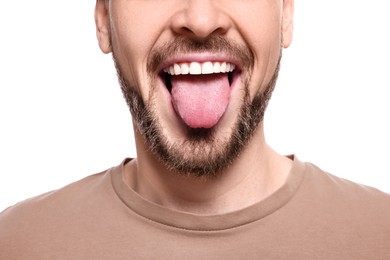 Happy man showing his tongue on white background, closeup