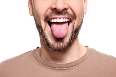 Photo of Happy man showing his tongue on white background, closeup