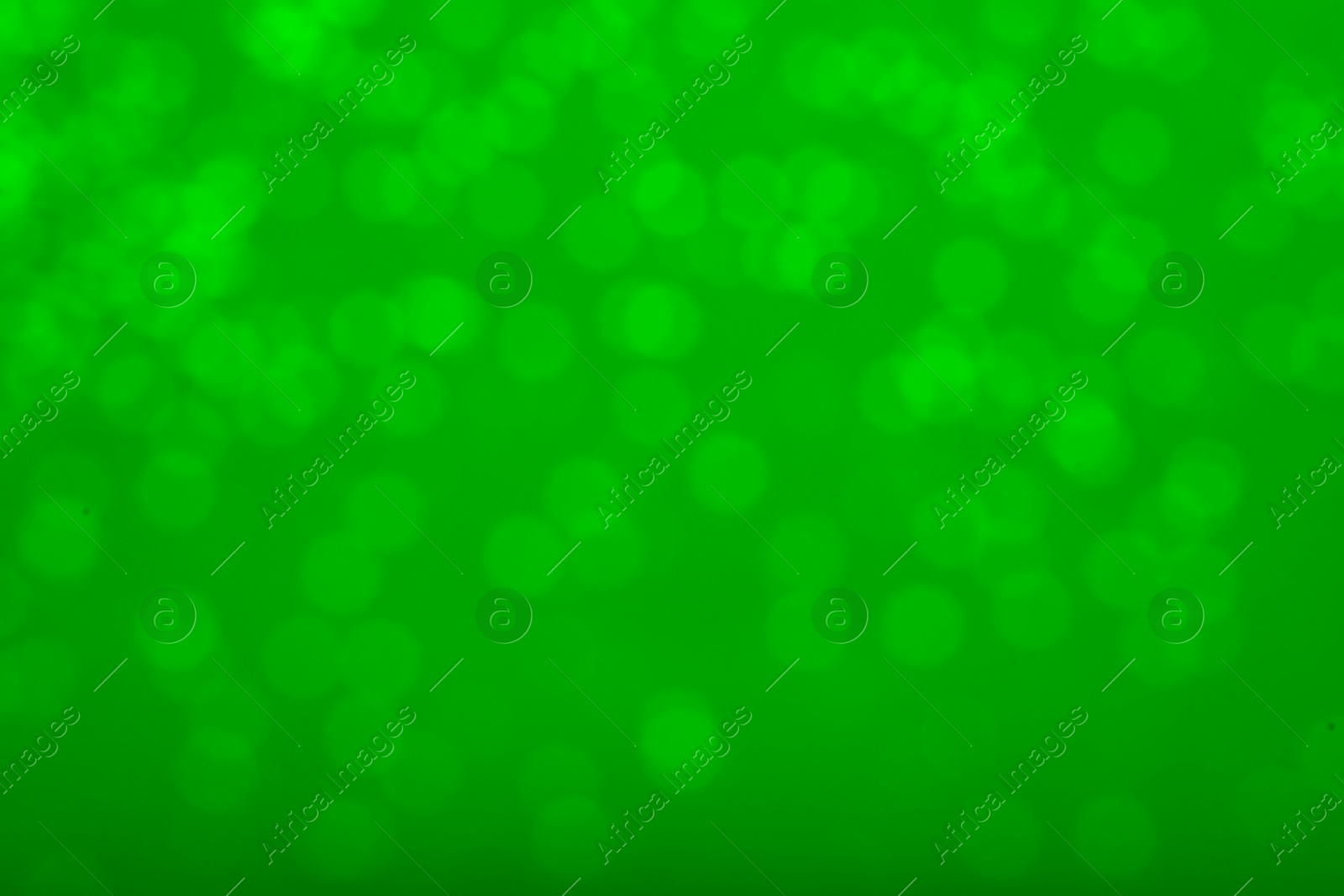 Image of St. Patrick day. Green background with blurred lights, bokeh effect