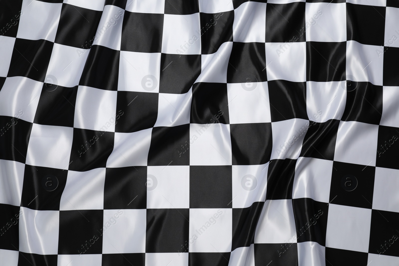 Photo of Checkered satin fabric as background, closeup view