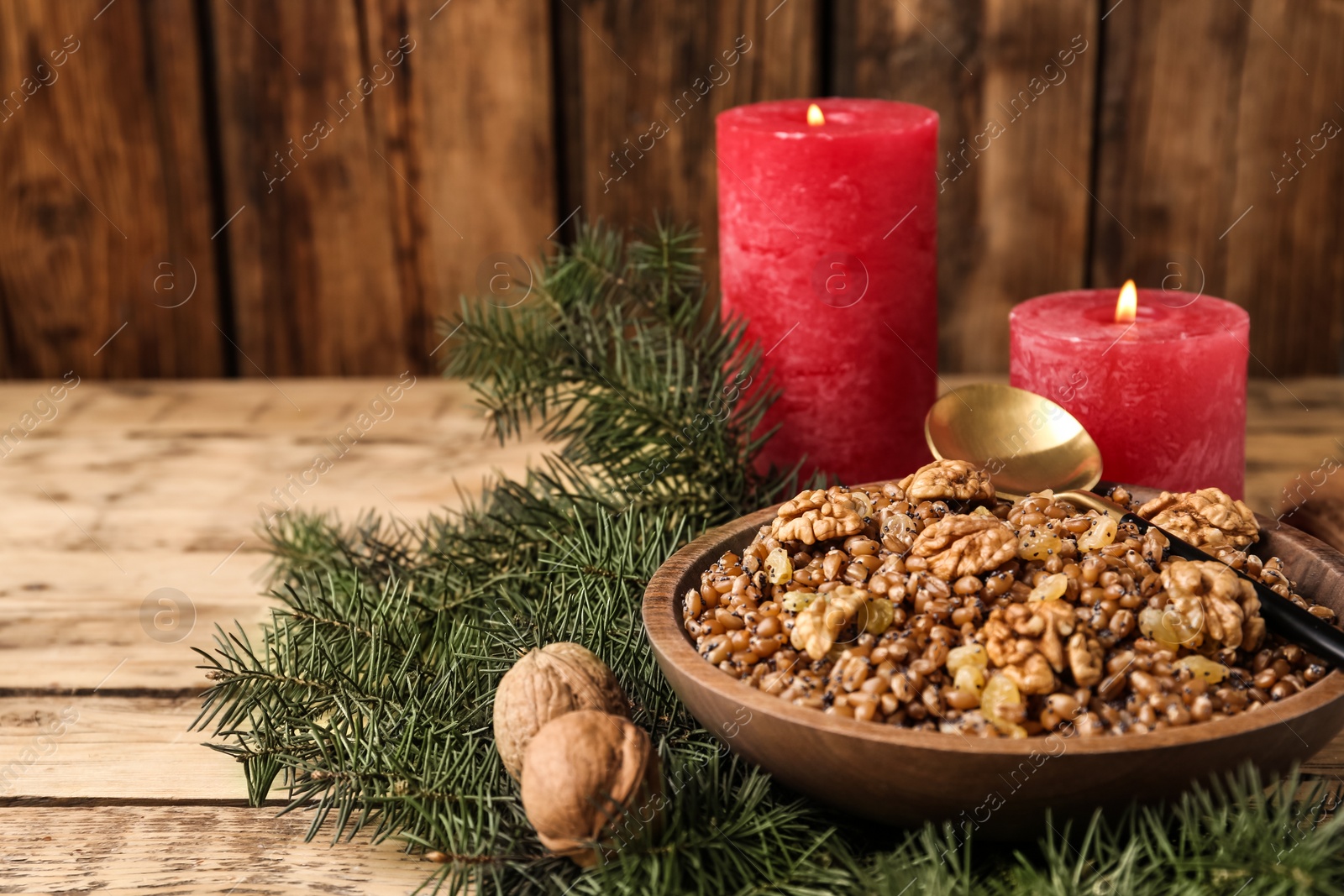 Photo of Traditional Christmas slavic dish kutia served on wooden table. Space for text