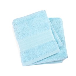 Photo of Light blue soft terry towel isolated on white, top view