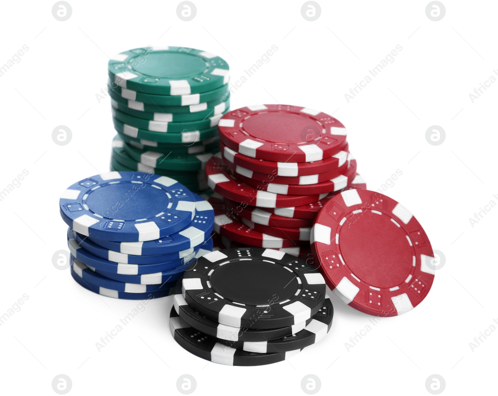 Photo of Plastic casino chips stacked on white background. Poker game