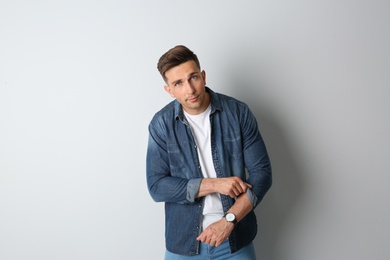 Photo of Portrait of handsome man on light background