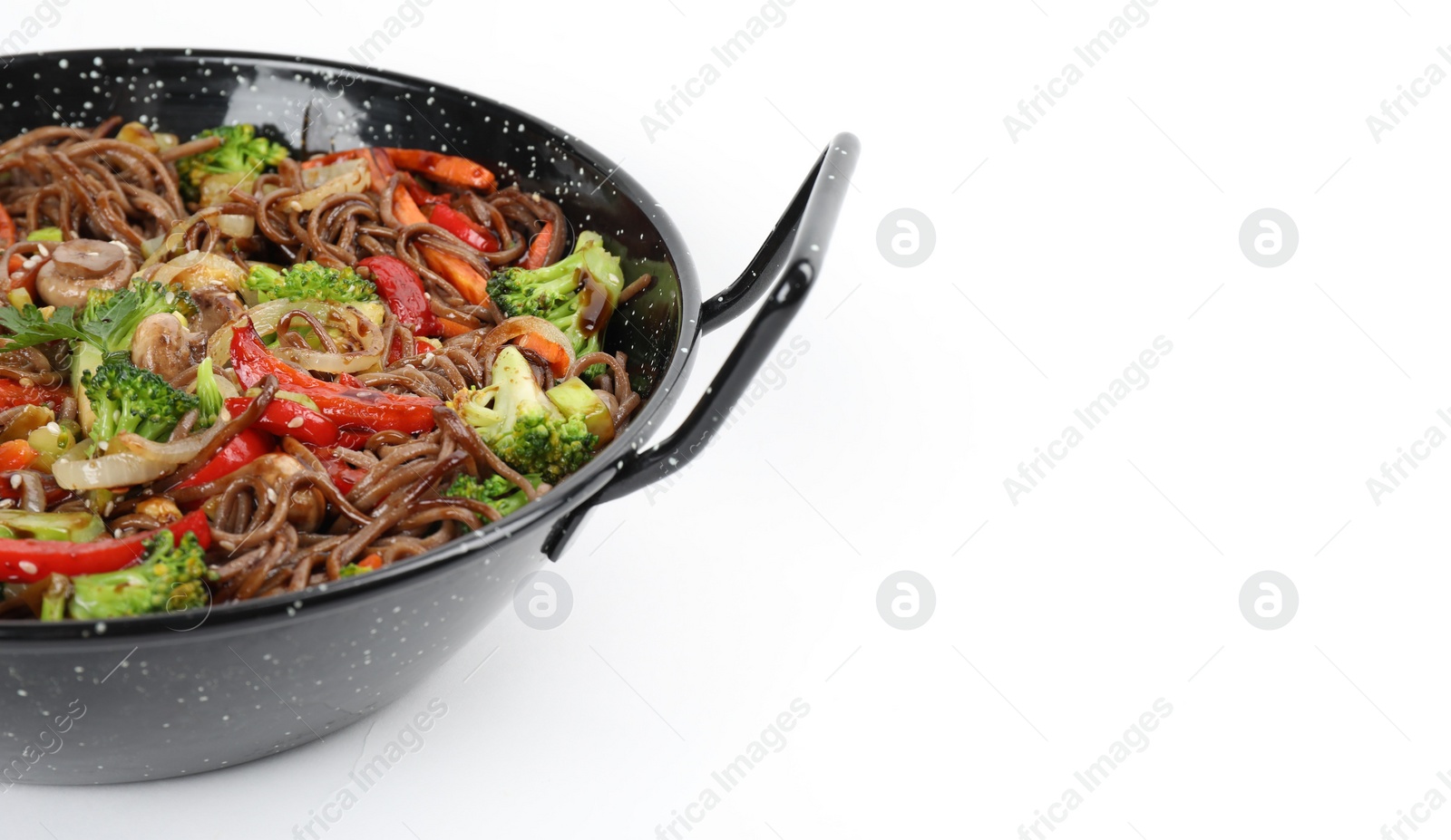 Photo of Stir-fry. Tasty noodles with meat and vegetables in wok on white background, space for text