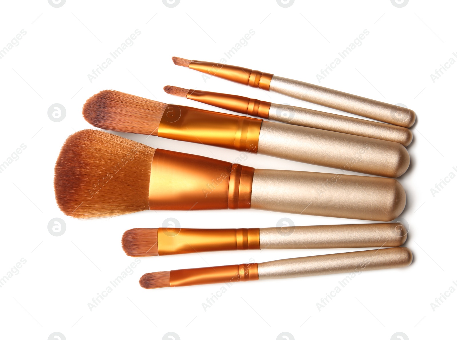 Photo of Makeup brushes of professional artist on white background