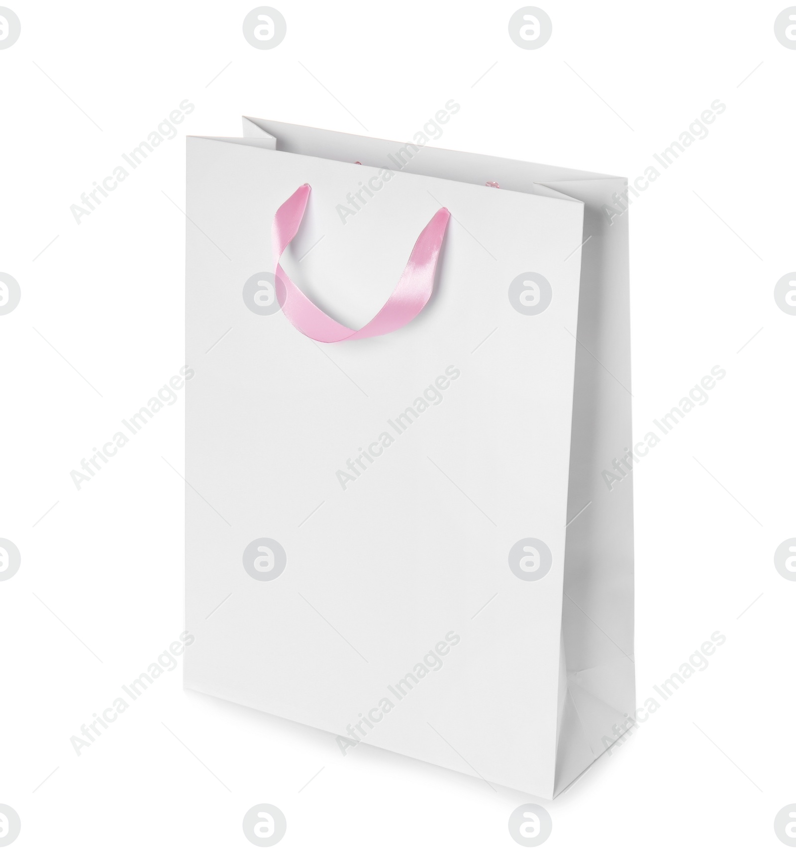 Photo of Paper shopping bag isolated on white. Mock up for design