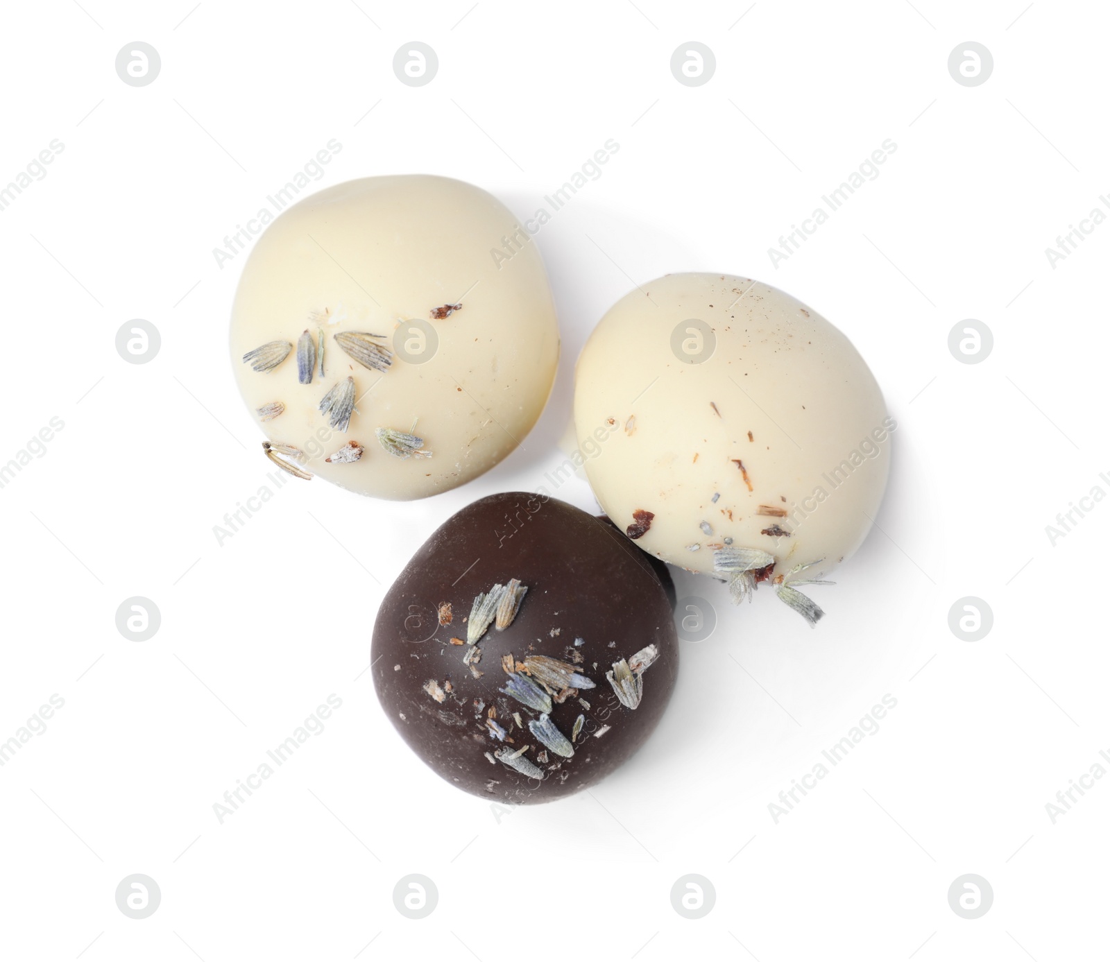 Photo of Tasty chocolate candies isolated on white, top view