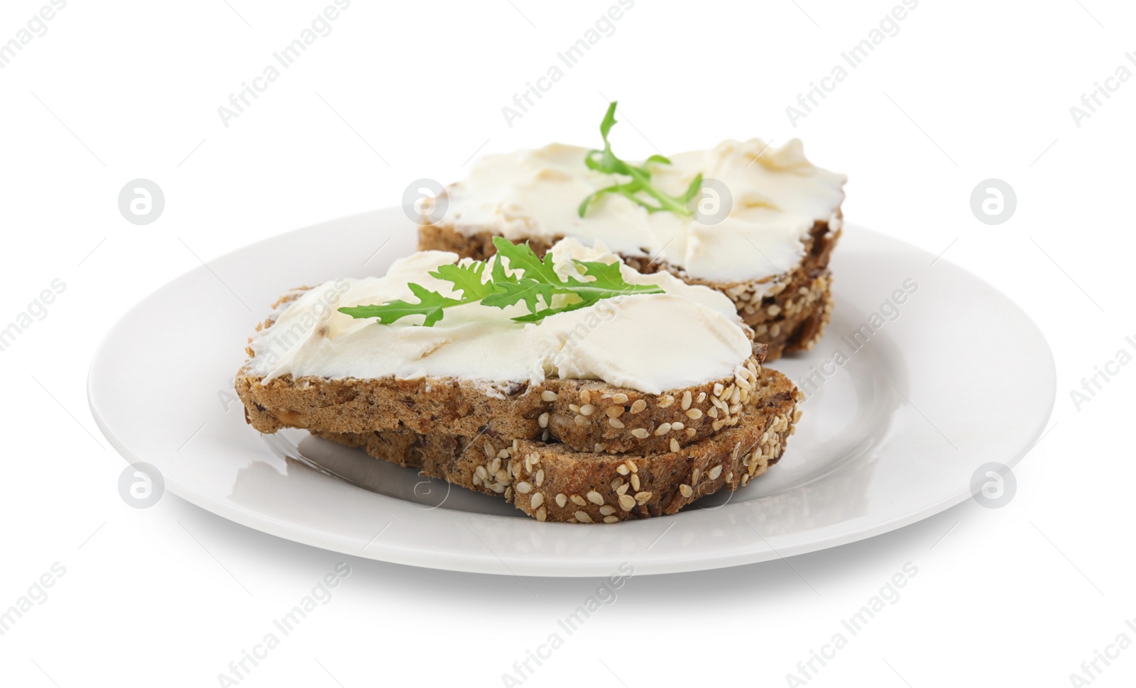 Photo of Bread with cream cheese and arugula on white background