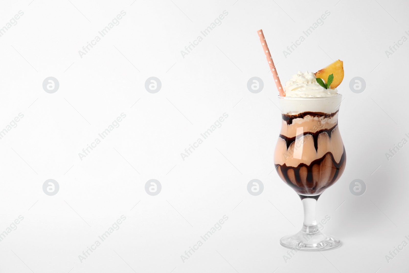 Photo of Glass of tasty milk shake on white background