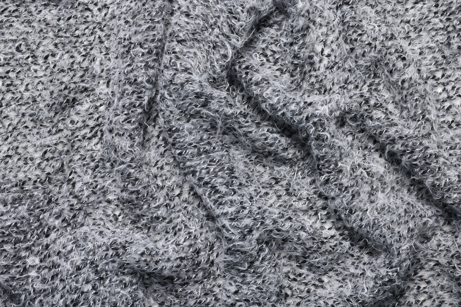 Photo of Texture of soft color crumpled fabric as background, top view