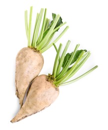 Photo of Freshly harvested sugar beets on white background, top view