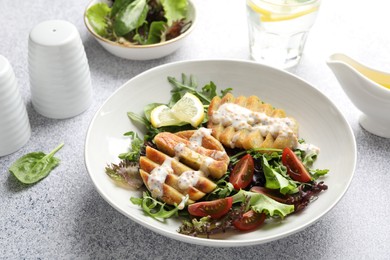 Healthy dish high in vegetable fats on light textured table, closeup