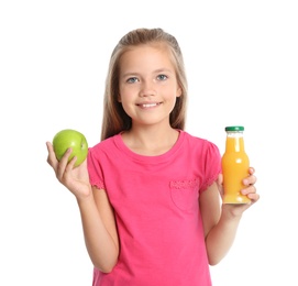 Happy girl holding apple and bottle of juice on white background. Healthy food for school lunch