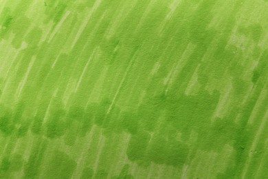 Abstract painting drawn with light green marker as background, top view