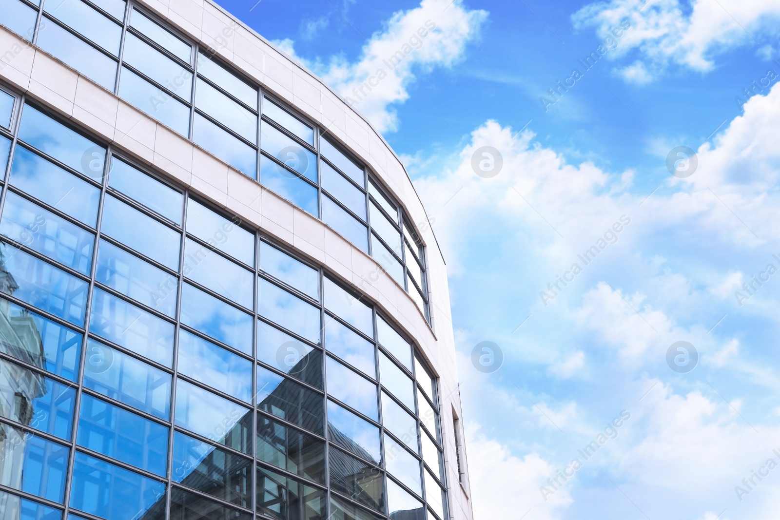 Photo of Building with tinted windows. Modern architectural design