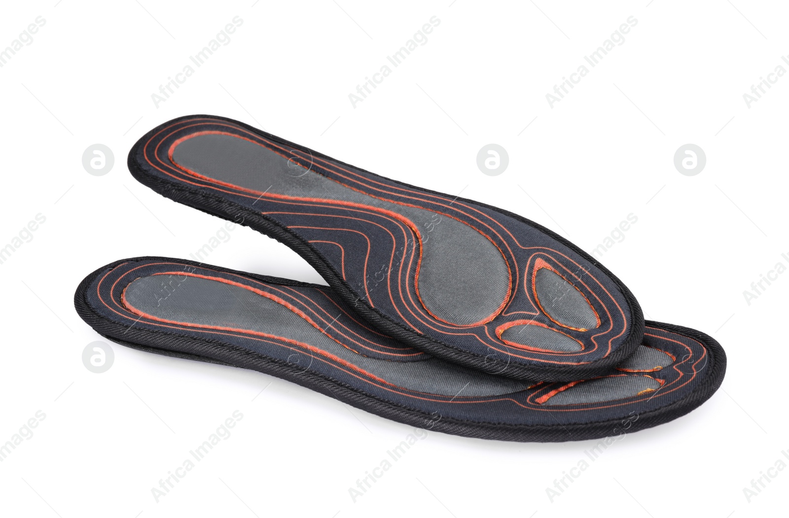 Photo of Orthopedic insoles for shoes on white background