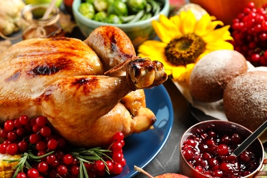 Composition with delicious turkey and autumn vegetables as background, closeup. Happy Thanksgiving day