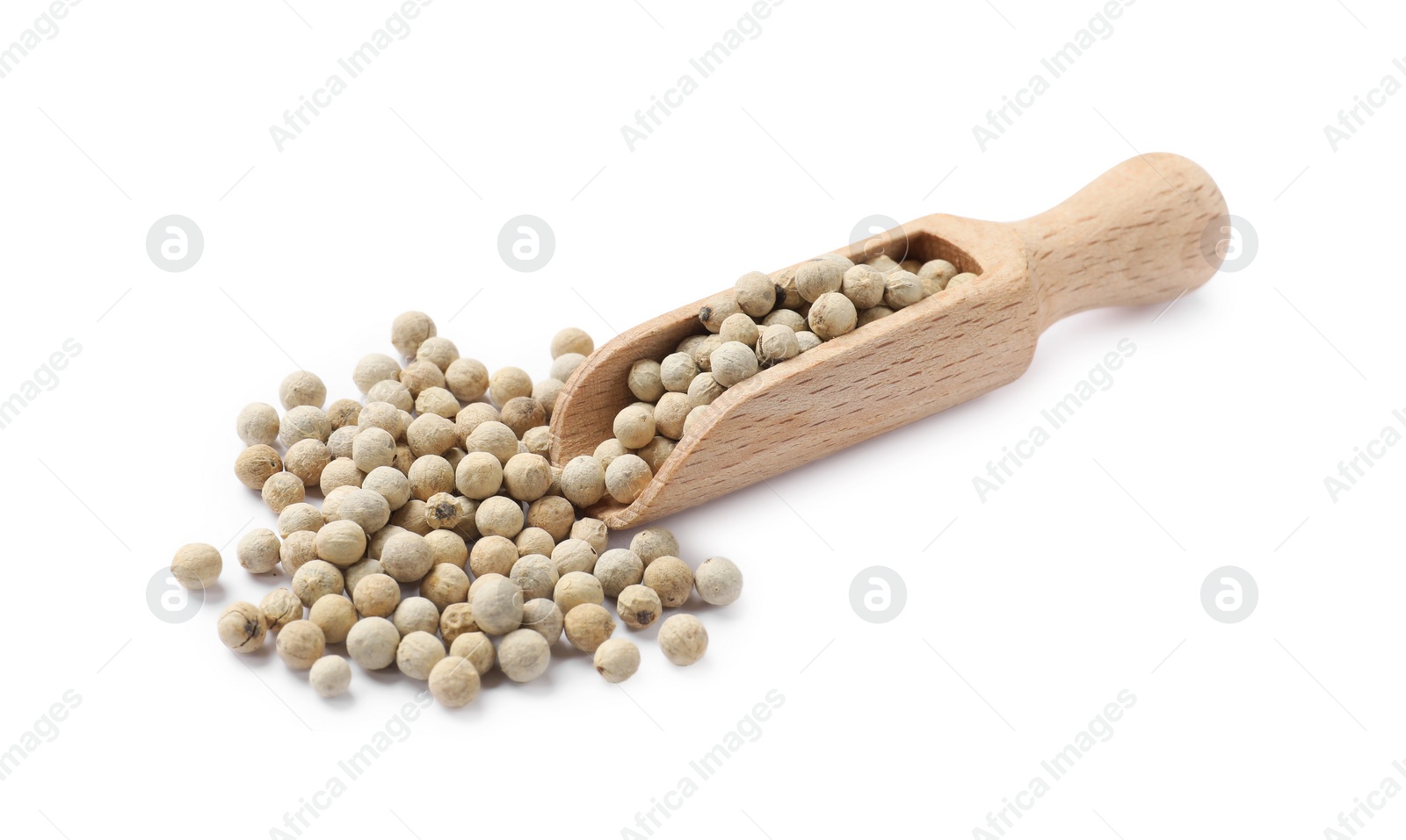 Photo of Aromatic spice. Many peppercorns in scoop isolated on white