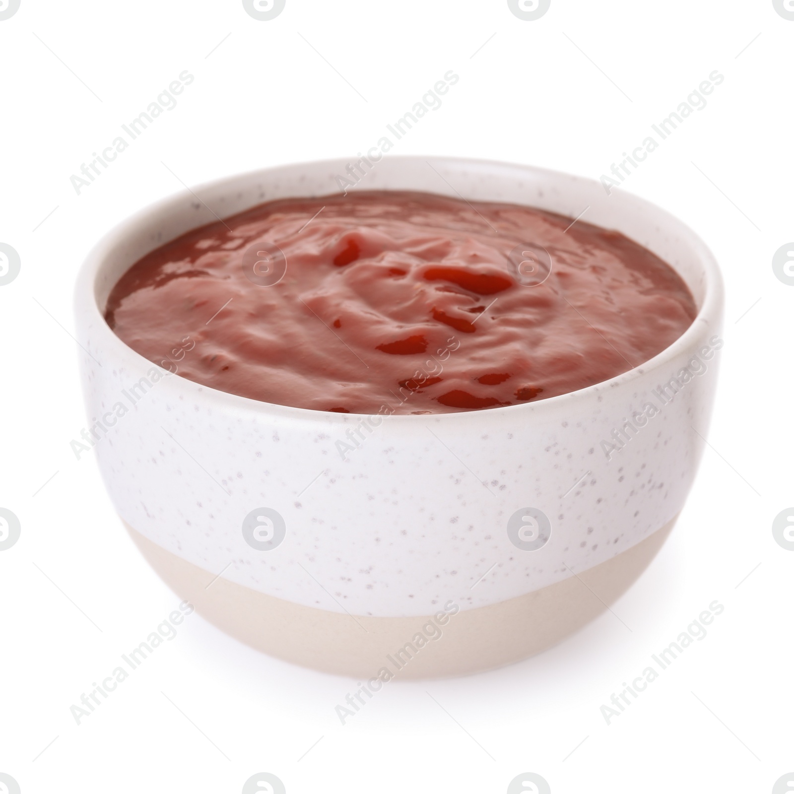 Photo of Bowl with red sauce isolated on white