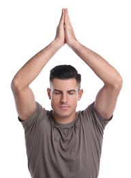 Handsome man meditating on white background. Harmony and zen