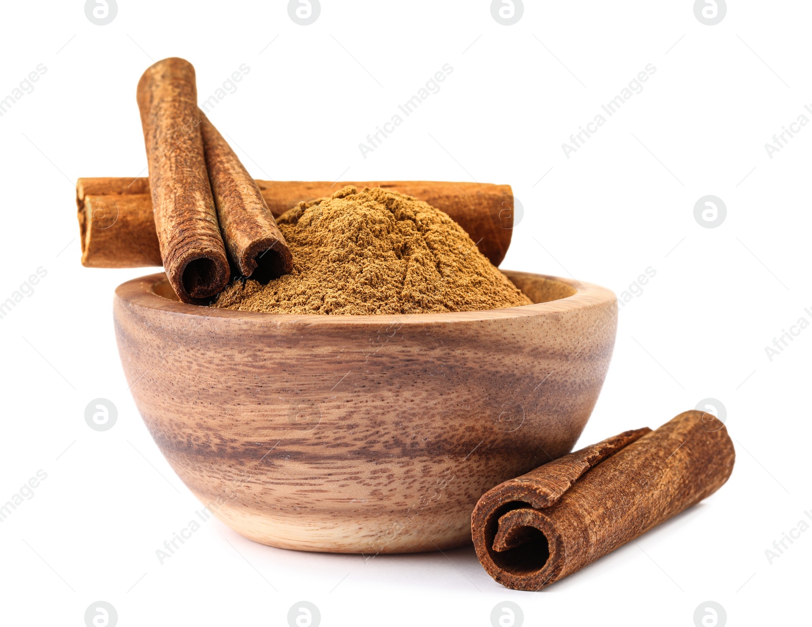 Photo of Dry aromatic cinnamon sticks and powder isolated on white