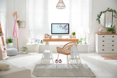 Photo of Stylish home office interior with comfortable workplace