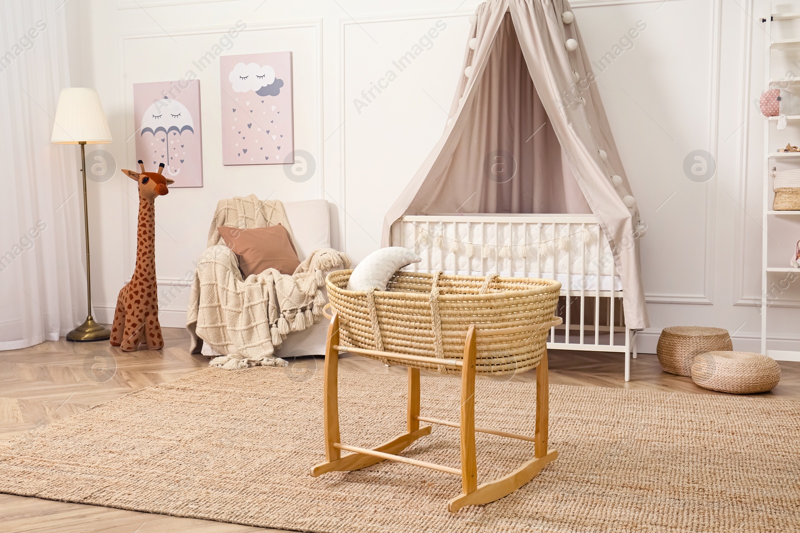 Photo of Baby room interior with toys and stylish furniture