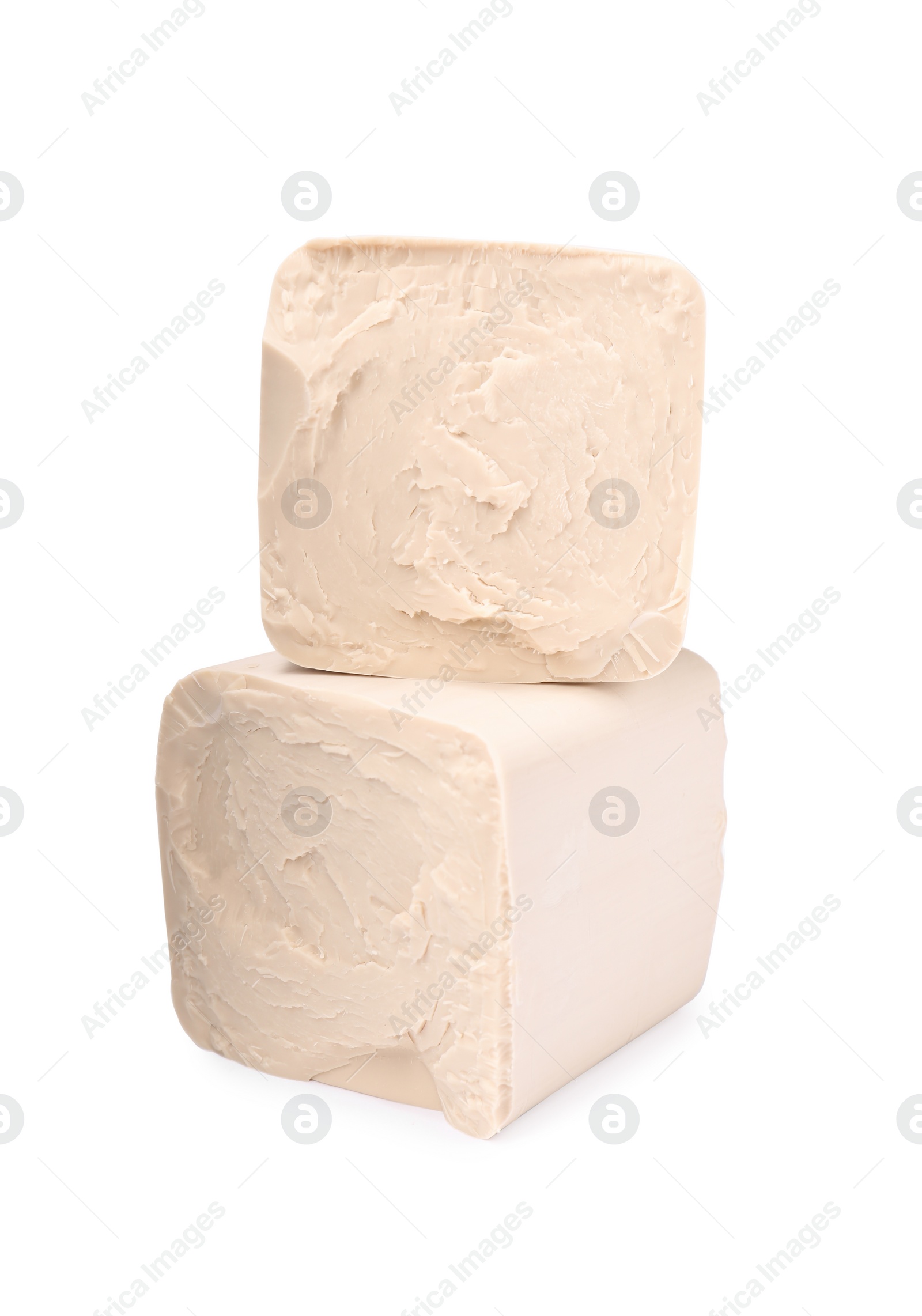Photo of Blocks of compressed yeast isolated on white