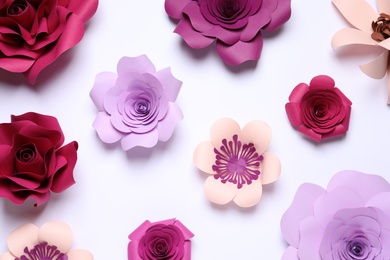 Different beautiful flowers made of paper on white background, flat lay