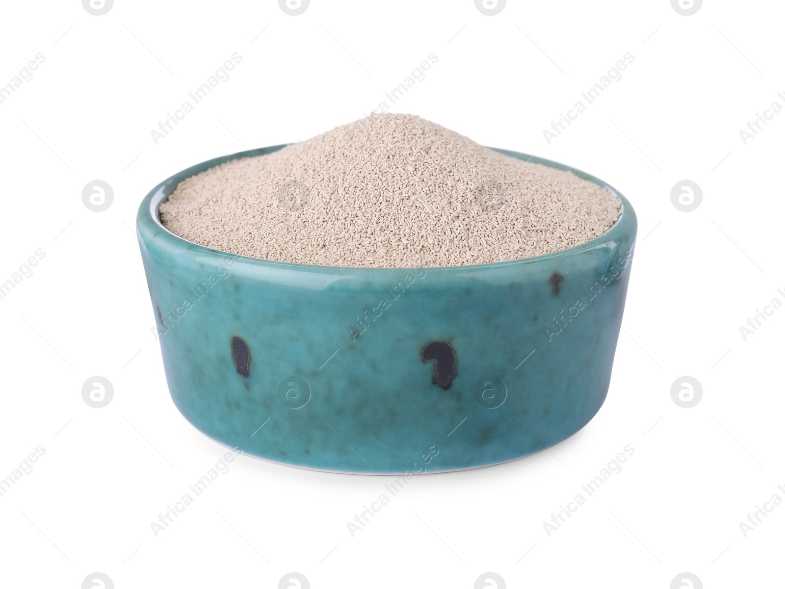 Photo of Bowl of active dry yeast isolated on white