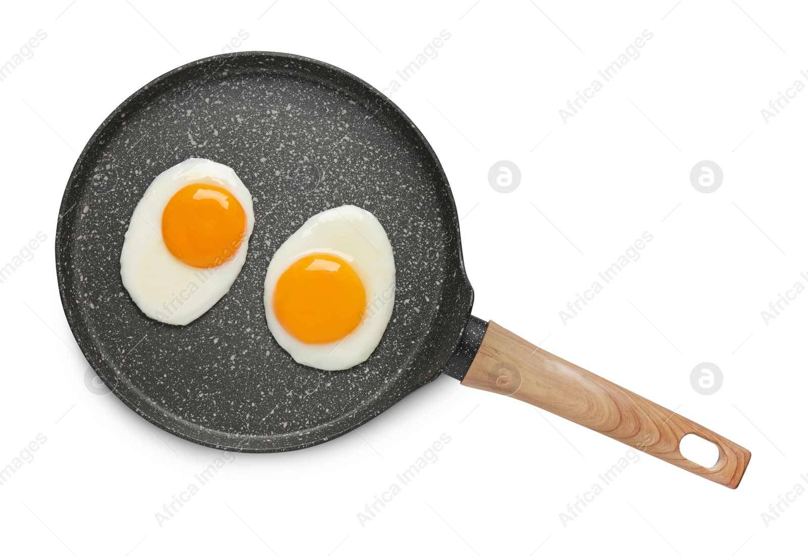 Photo of Tasty cooked chicken eggs in frying pan isolated on white, top view