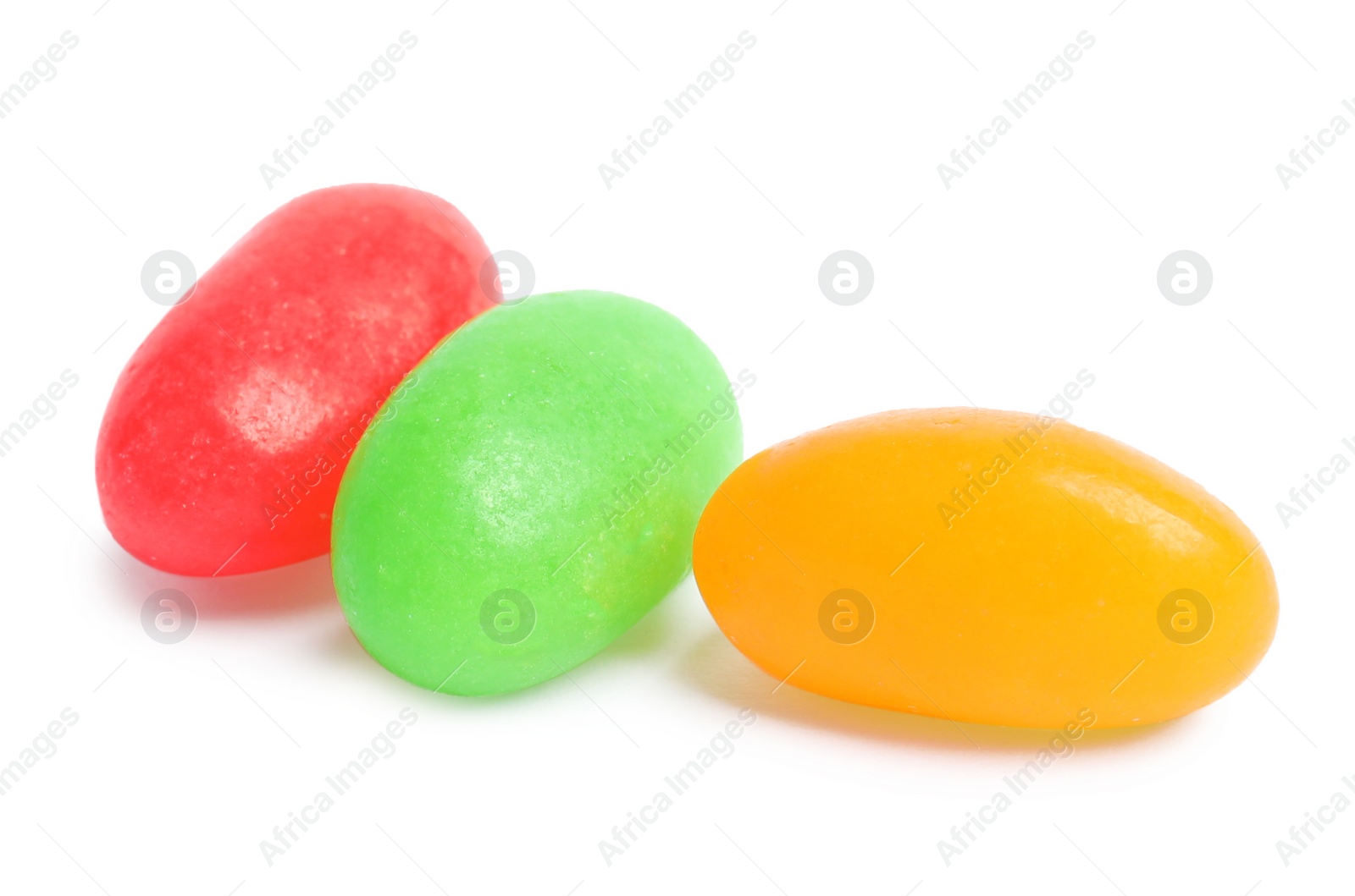 Photo of Delicious colorful jelly beans isolated on white