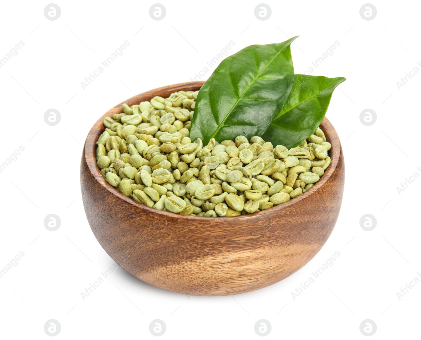 Photo of Wooden bowl with green coffee beans and fresh leaves on white background