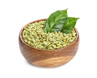 Wooden bowl with green coffee beans and fresh leaves on white background