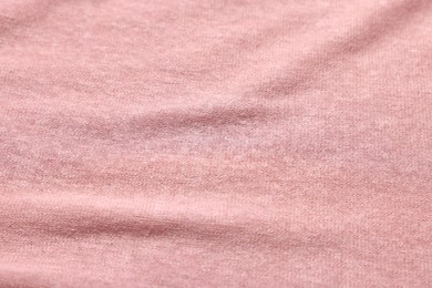 Photo of Texture of soft pink fabric as background, above view