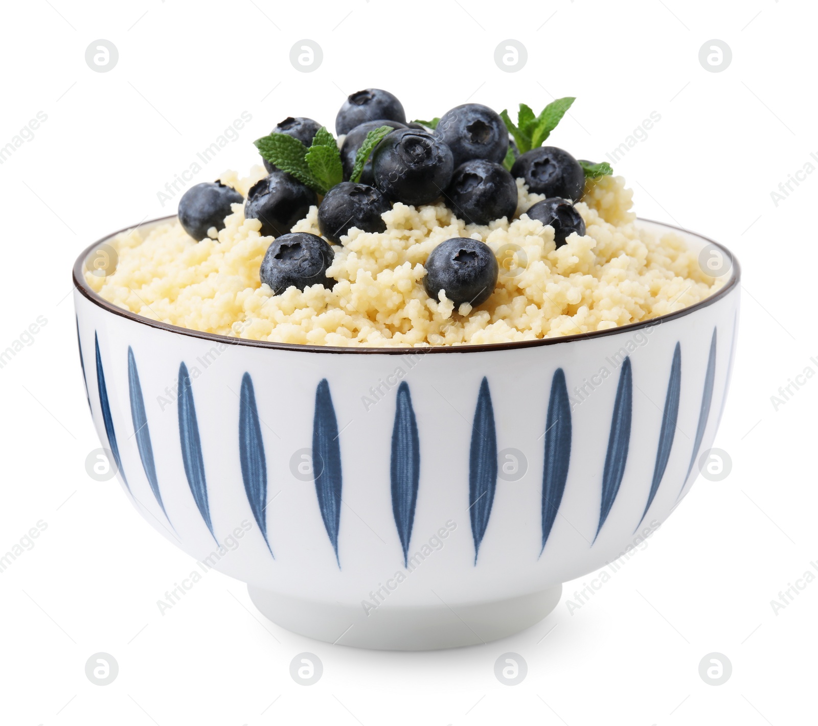 Photo of Bowl of tasty couscous with blueberries and mint isolated on white