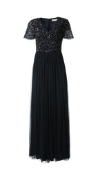 Photo of Beautiful long black party dress with paillettes on white background
