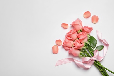 Photo of Bouquet of beautiful roses on white background