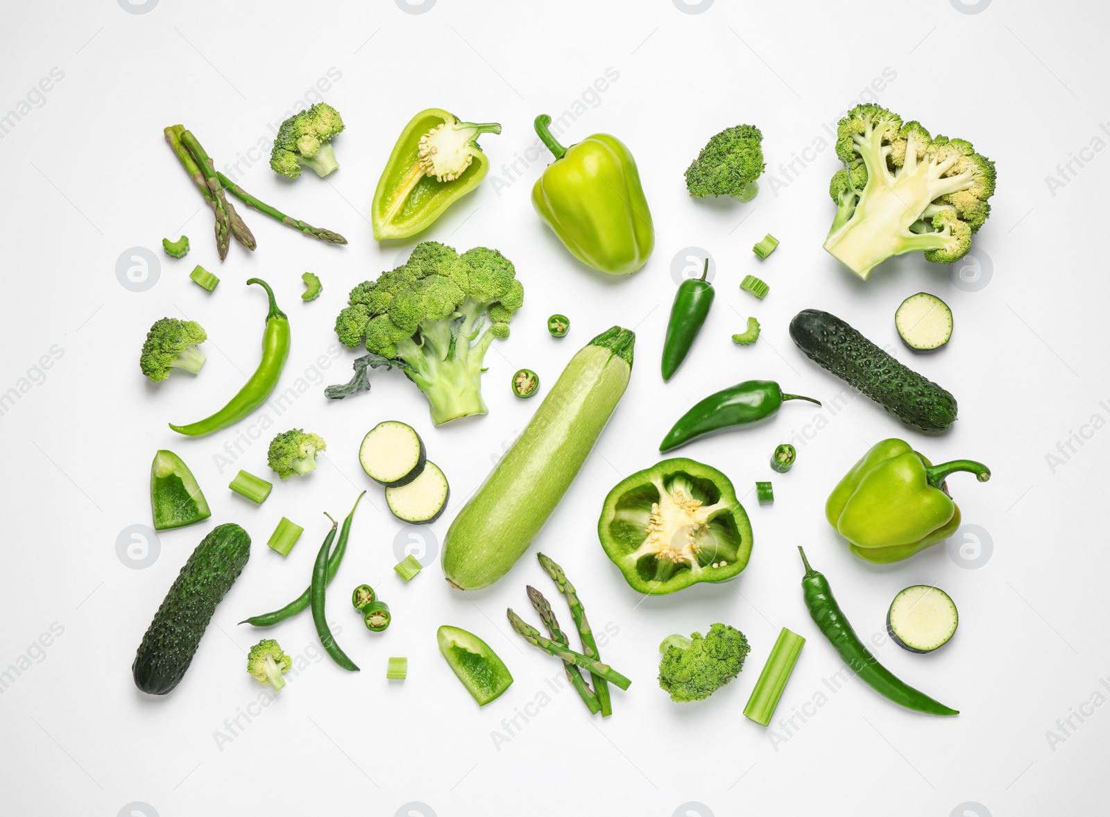 Photo of Flat lay composition with fresh vegetables on white background