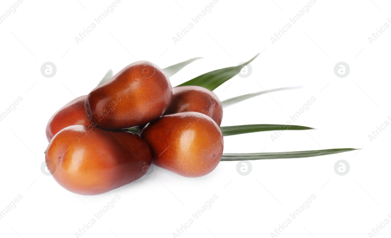 Photo of Fresh ripe oil palm fruits with leaf isolated on white