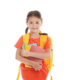 Cute child with school stationery on white background