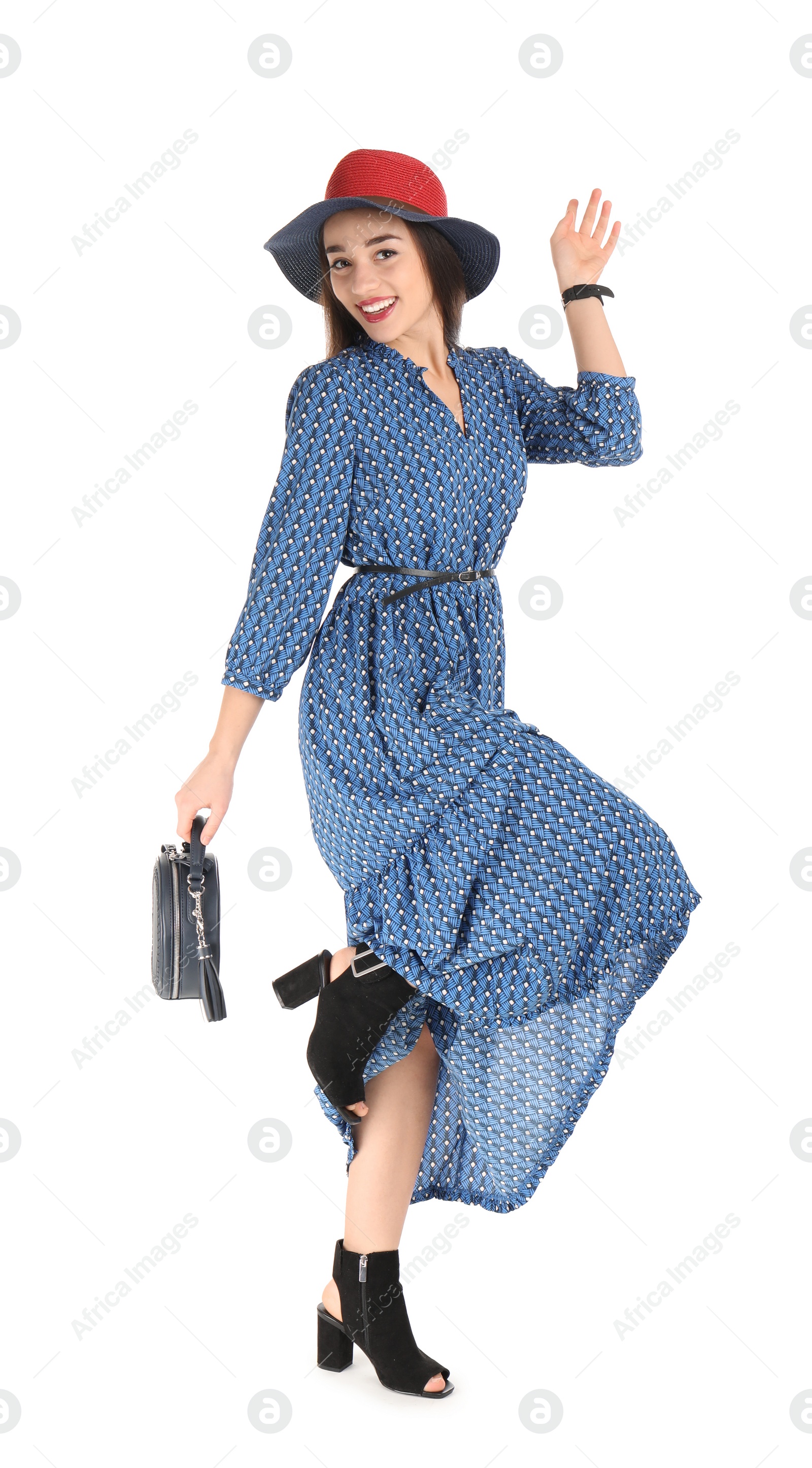 Photo of Portrait of beautiful young woman in stylish dress on white background