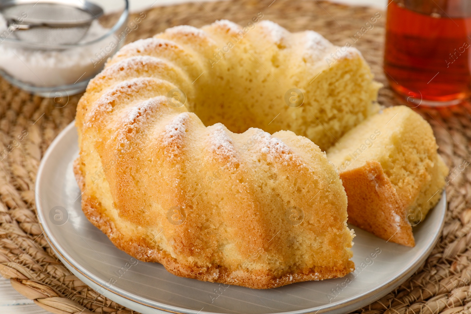 Photo of Delicious freshly baked sponge cake on table, closeup