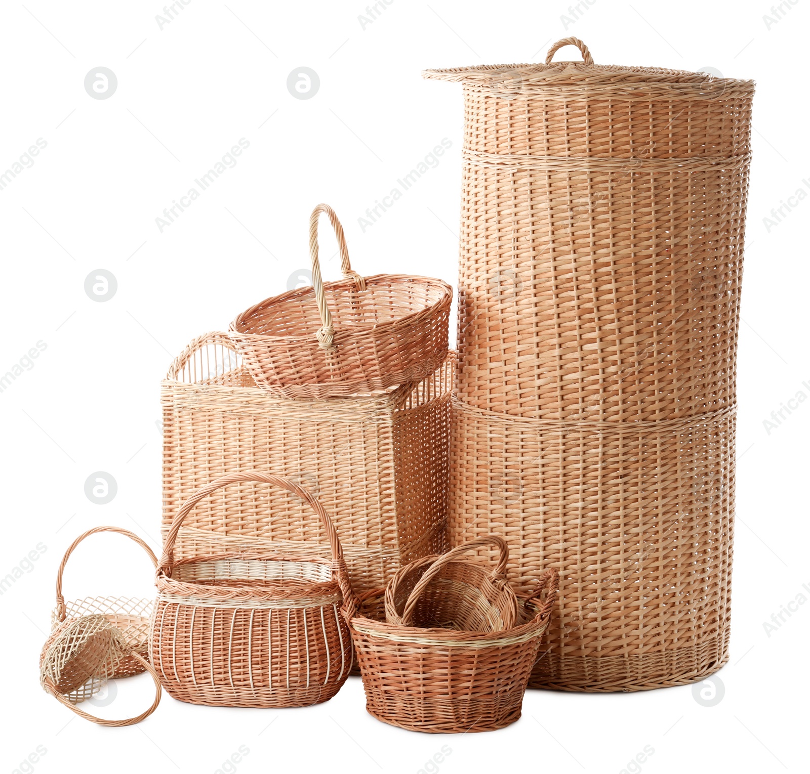 Photo of Many different wicker baskets on white background