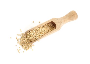 Wooden scoop with quinoa on white background, top view