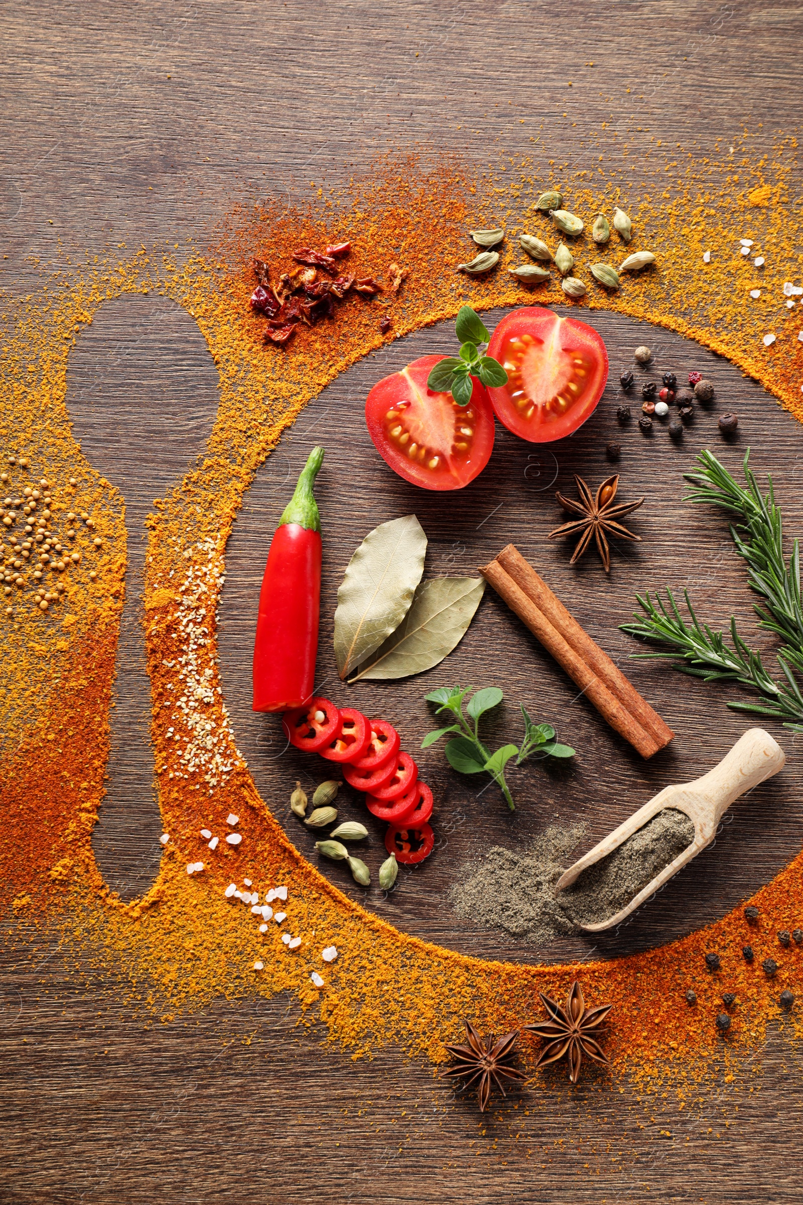 Photo of Silhouettes of plate with spoon made of spices and different ingredients on wooden table, flat lay