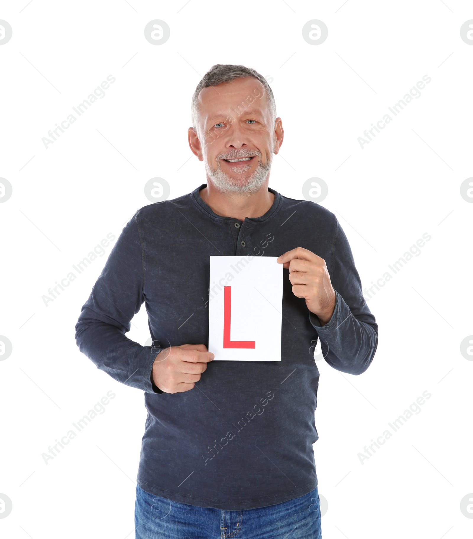 Photo of Happy mature man with L-plate on white background. Getting driving license