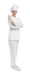 Woman chef in uniform holding wooden spoon on white background